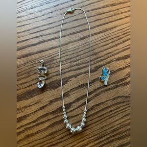 Necklace with two pendants to be added to a chain. Excellent condition